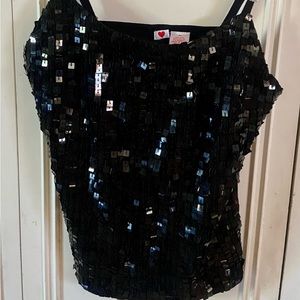 Cute little shirt to wear under jacket or sweater. Black size Medium. Never worn